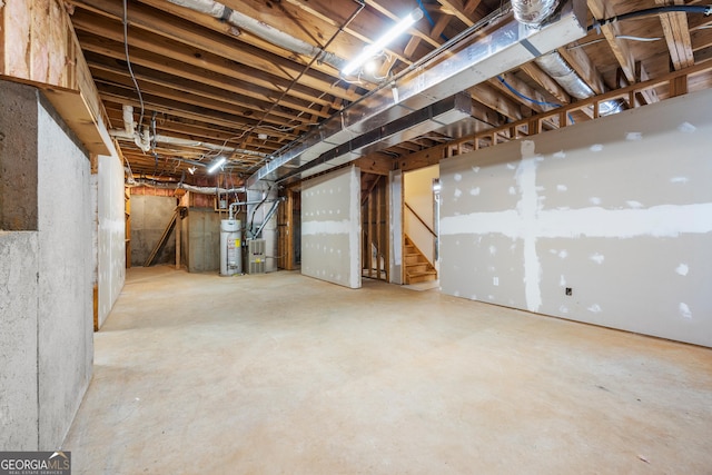 basement featuring water heater