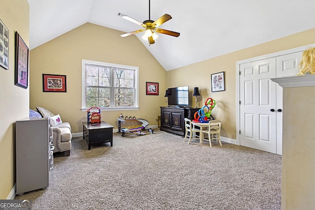 rec room featuring carpet, lofted ceiling, and ceiling fan