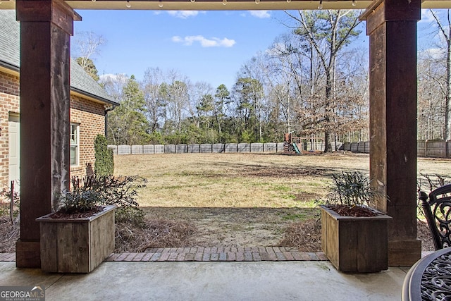 view of yard with a playground