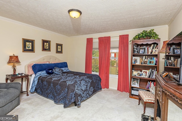 bedroom with crown molding, a textured ceiling, and carpet flooring