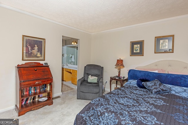 bedroom with ensuite bath, ornamental molding, light carpet, and a textured ceiling