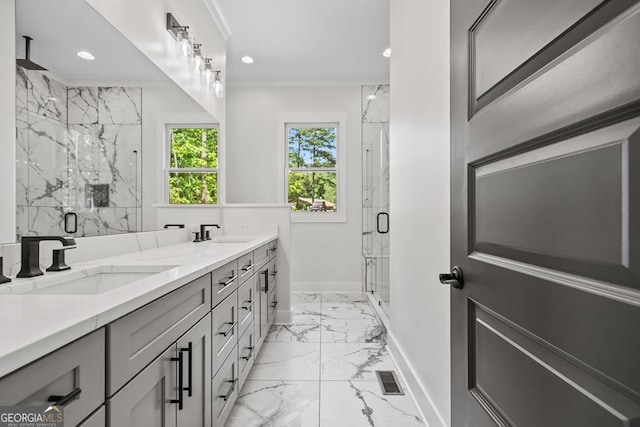 bathroom with walk in shower, vanity, and crown molding