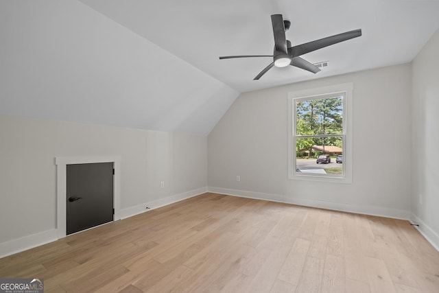 bonus room with ceiling fan, lofted ceiling, and light hardwood / wood-style floors