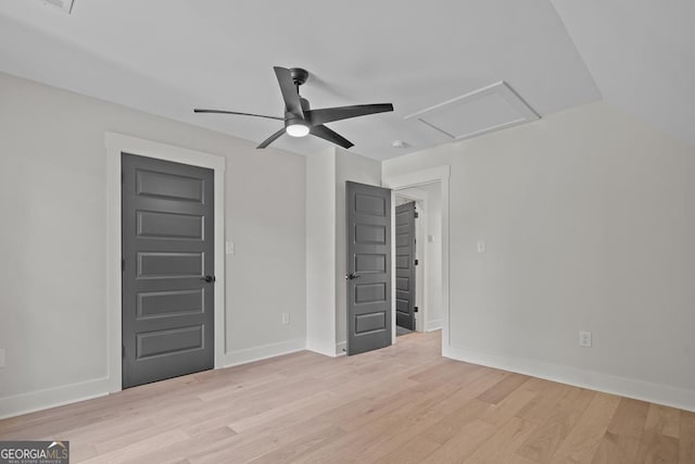 spare room featuring ceiling fan and light wood-type flooring