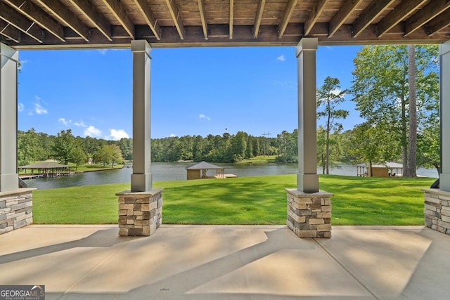 view of patio / terrace with a water view