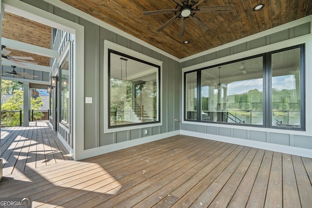 wooden deck with ceiling fan