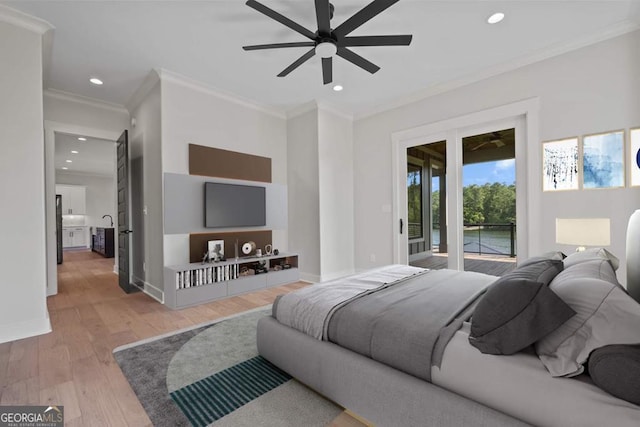 bedroom featuring crown molding, access to outside, ceiling fan, and light wood-type flooring