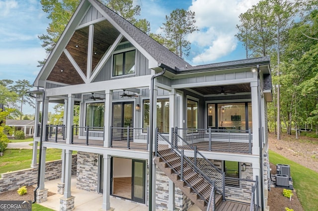 back of house with a balcony, cooling unit, ceiling fan, and a patio area