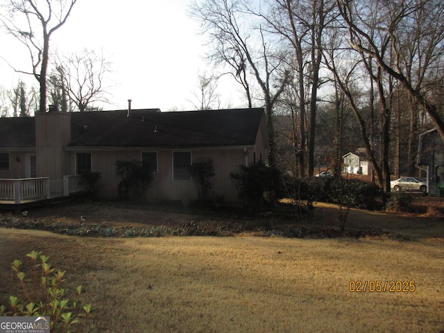 exterior space featuring a lawn