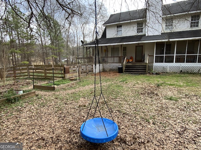 view of yard featuring a sunroom