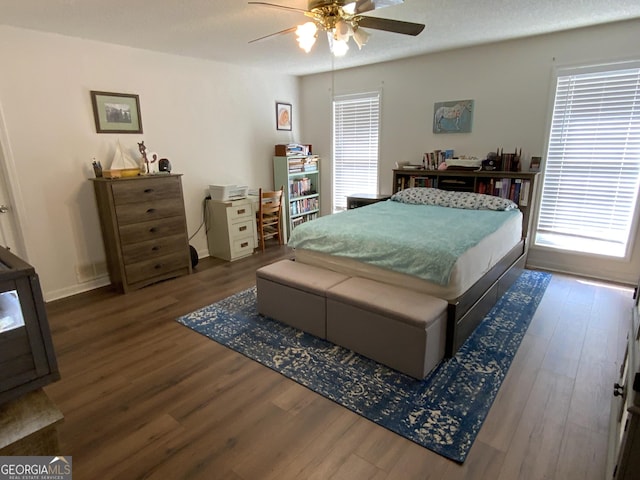 bedroom featuring ceiling fan and wood-type flooring