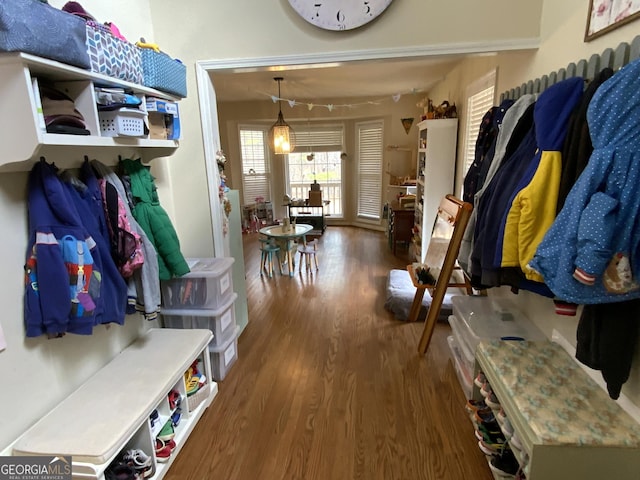 mudroom with dark wood-type flooring