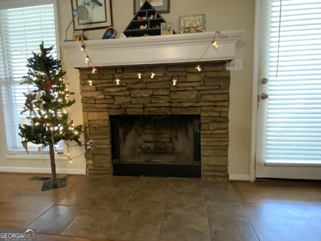 room details featuring a stone fireplace