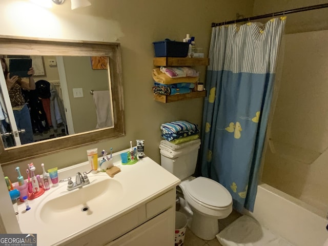 full bathroom with vanity, shower / bath combination with curtain, and toilet