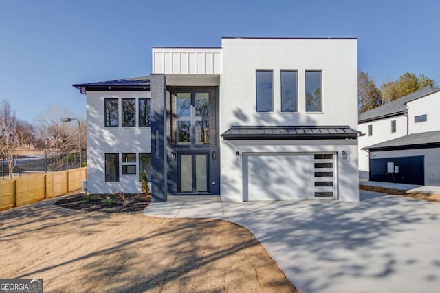 contemporary house featuring a garage