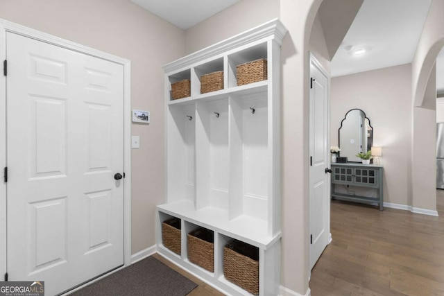 mudroom with dark hardwood / wood-style flooring