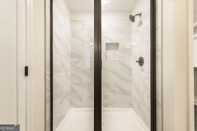 bathroom with a stall shower