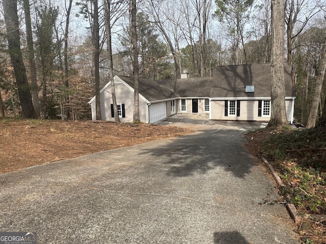 view of front of property featuring a garage