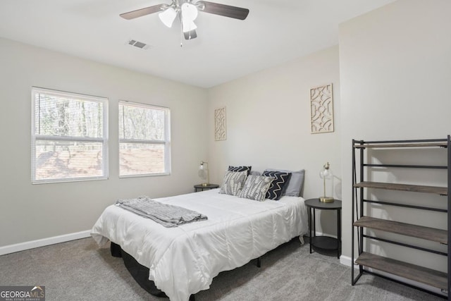 bedroom with ceiling fan and carpet