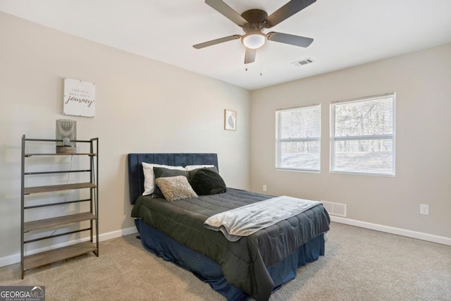 carpeted bedroom featuring ceiling fan