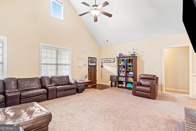 living room featuring carpet, a healthy amount of sunlight, high vaulted ceiling, and ceiling fan