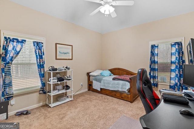 carpeted bedroom with ceiling fan