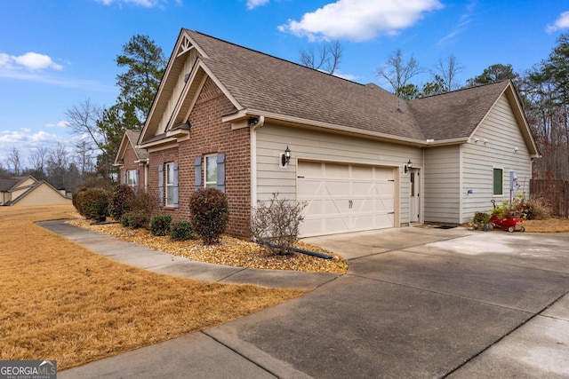 view of side of home with a garage