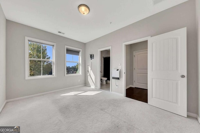 unfurnished bedroom featuring carpet floors