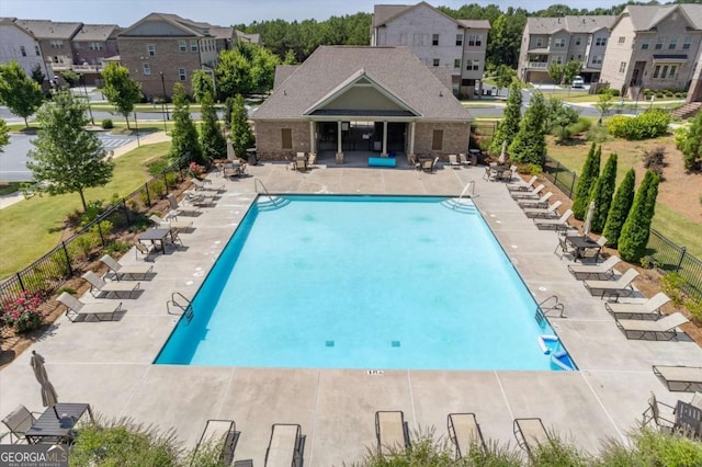 view of swimming pool with a patio area