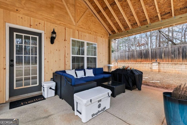 view of patio with area for grilling and an outdoor hangout area