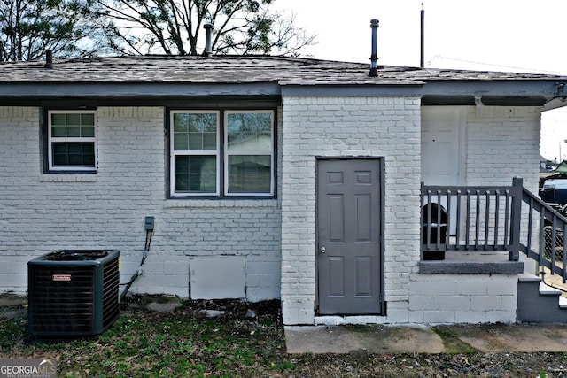 entrance to property with cooling unit