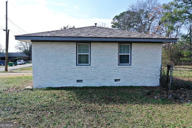 view of property exterior with a lawn