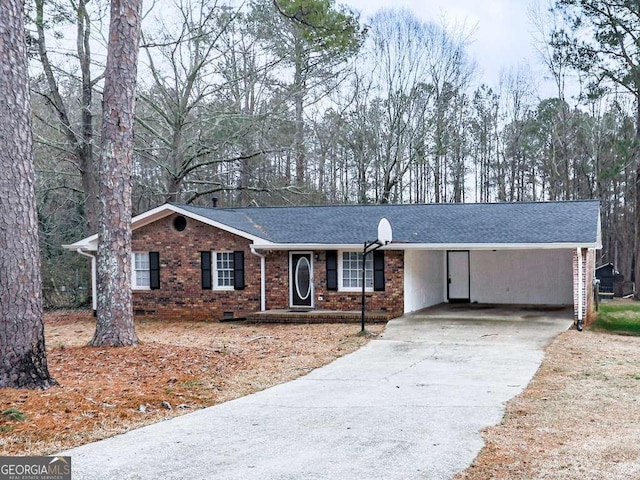 ranch-style home with a carport