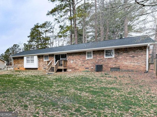 525 Henson Cir, Carrollton, GA 30117 - rear view of property with crawl space, brick siding, and a lawn