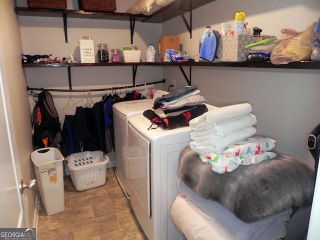 clothes washing area featuring washing machine and dryer