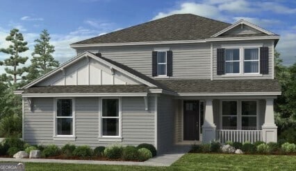 view of front of house featuring a porch and a front lawn