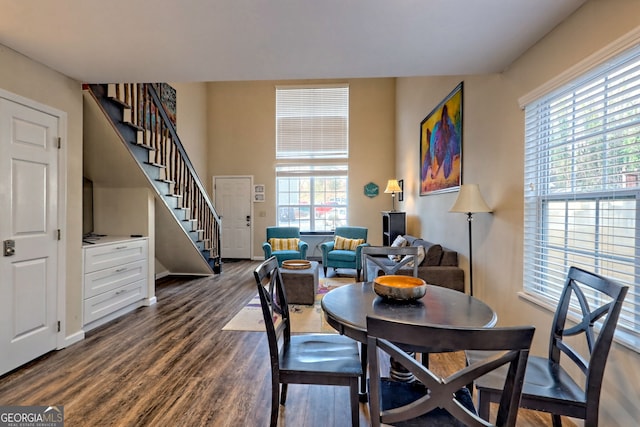 dining room with dark hardwood / wood-style floors