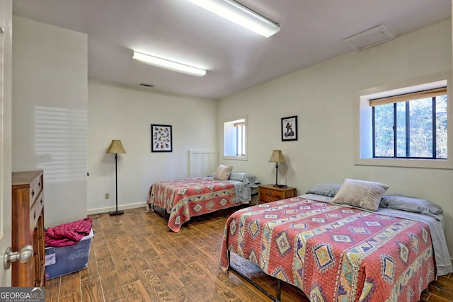 bedroom featuring hardwood / wood-style flooring