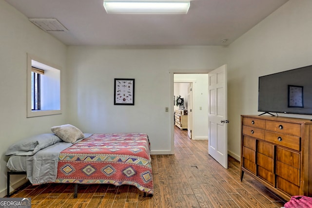 bedroom featuring hardwood / wood-style floors