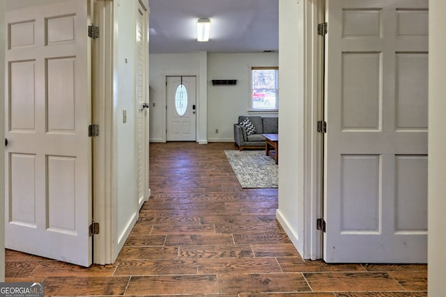 entrance foyer featuring dark hardwood / wood-style floors