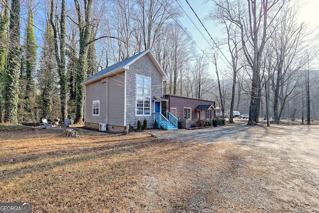 view of home's exterior with a yard