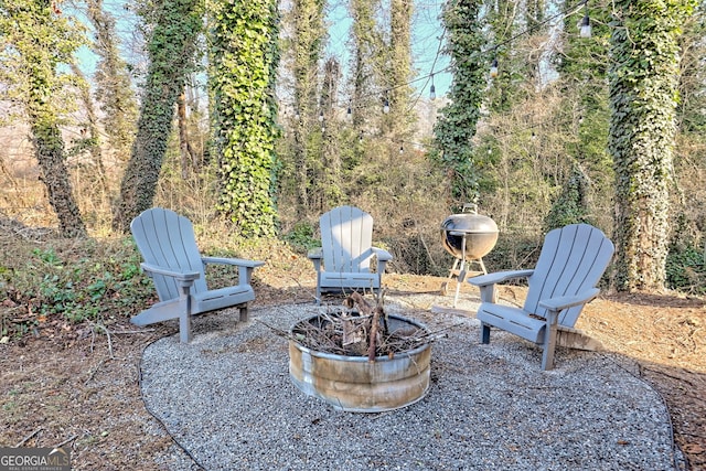 view of patio / terrace with a fire pit