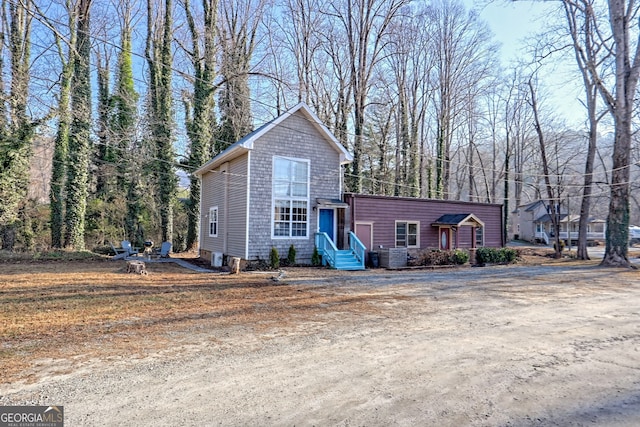 front of property featuring central air condition unit