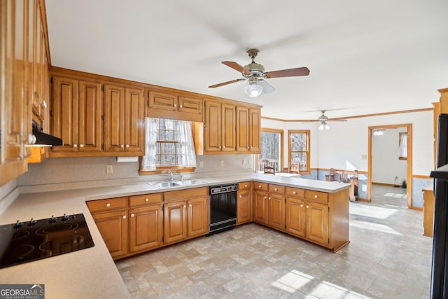 kitchen with black appliances, sink, ceiling fan, kitchen peninsula, and crown molding