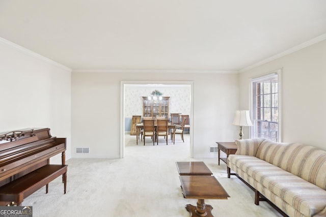 living room featuring ornamental molding and light colored carpet