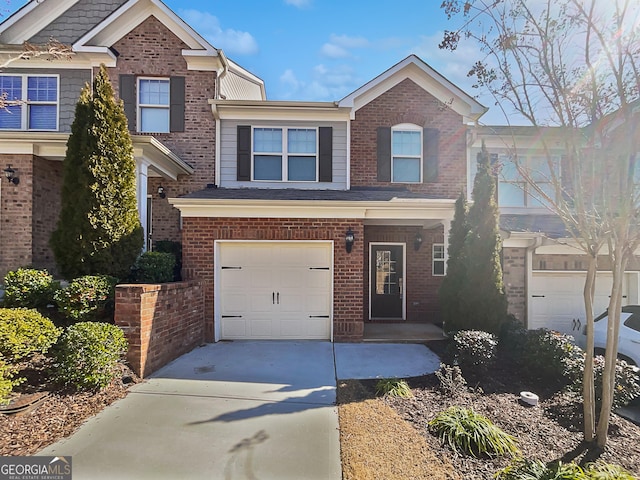 view of front of home with a garage