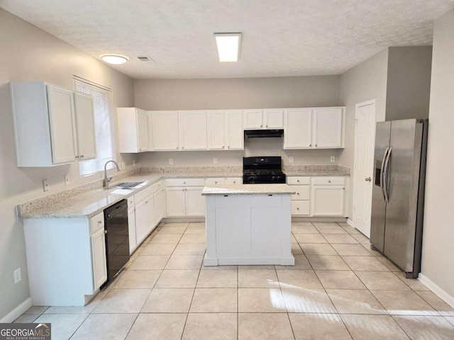 kitchen featuring white cabinetry, a center island, sink, and black appliances