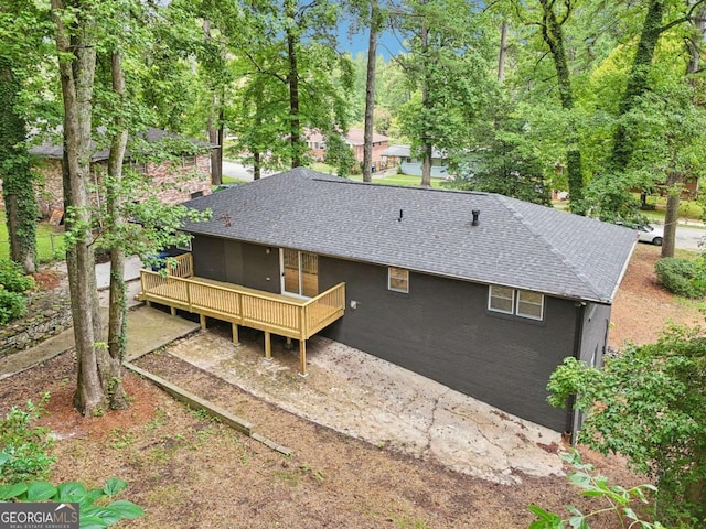 rear view of house with a deck