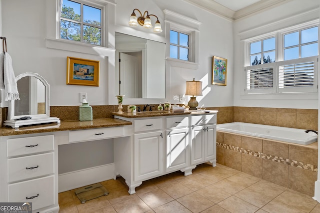 bathroom featuring crown molding, plenty of natural light, vanity, a relaxing tiled tub, and tile patterned floors