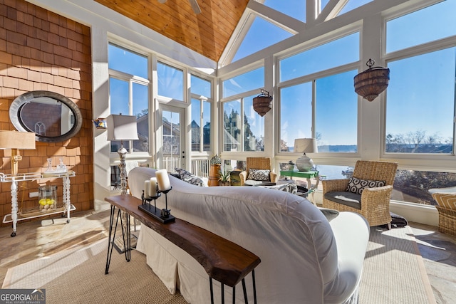 bedroom featuring high vaulted ceiling and wooden ceiling